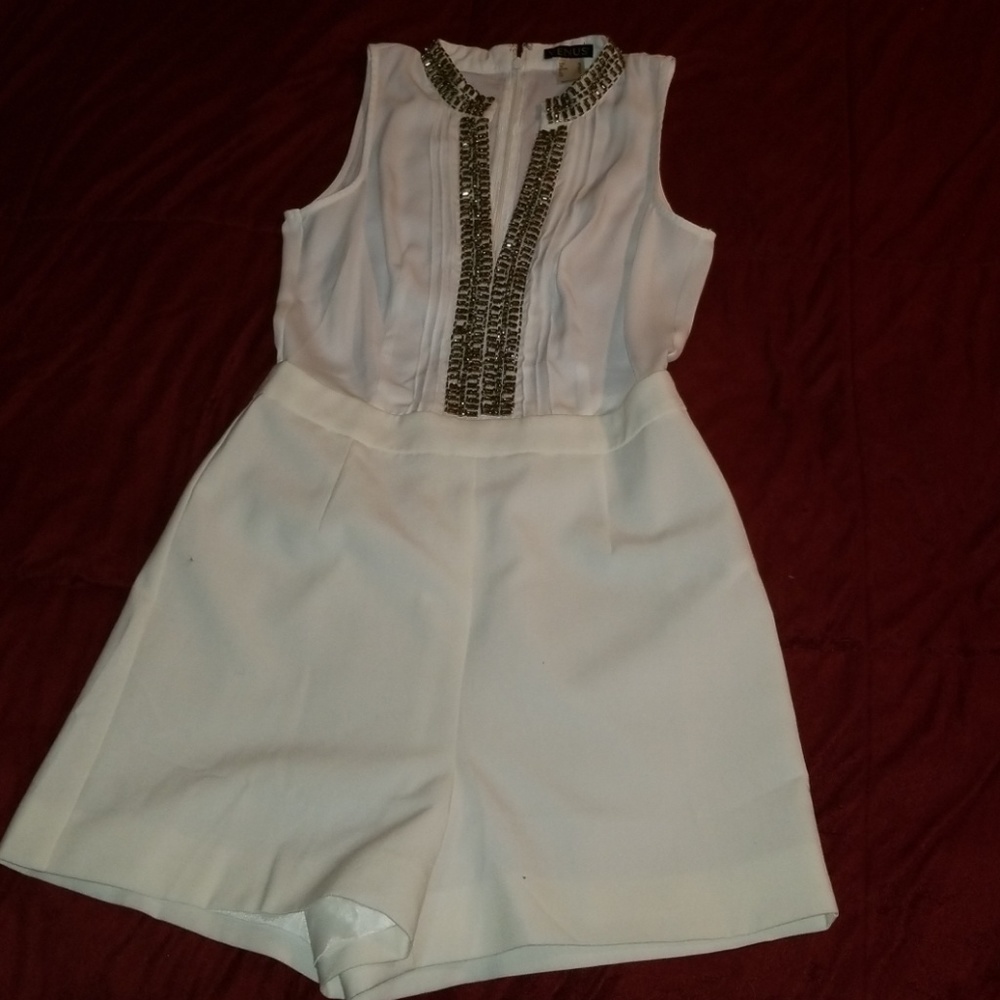 Elegant bead detailing romper.